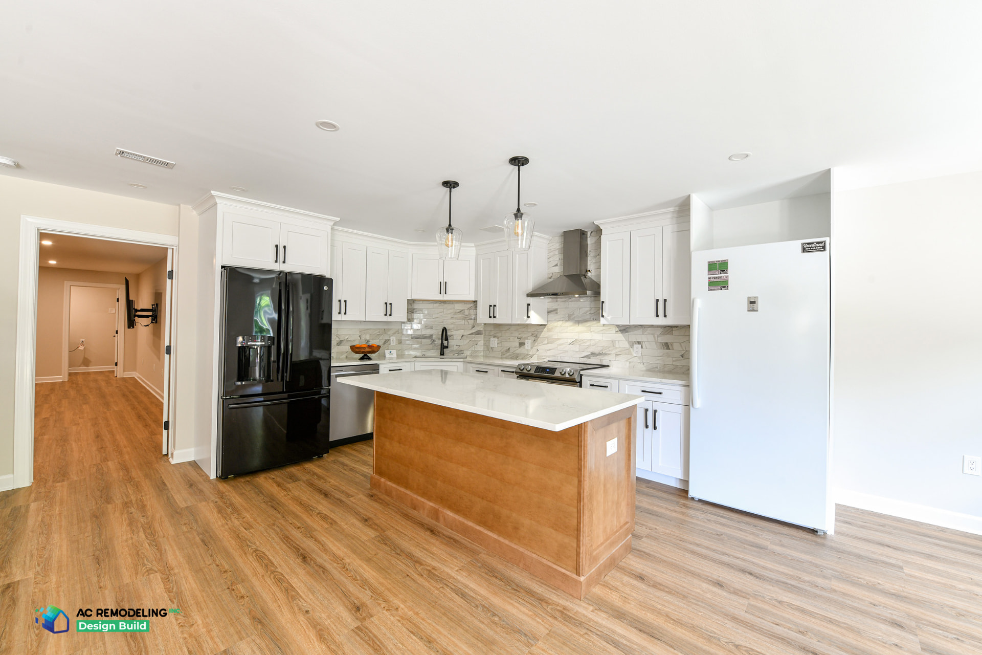 Wide view of the finished Rockville basement ADU kitchen and open living area