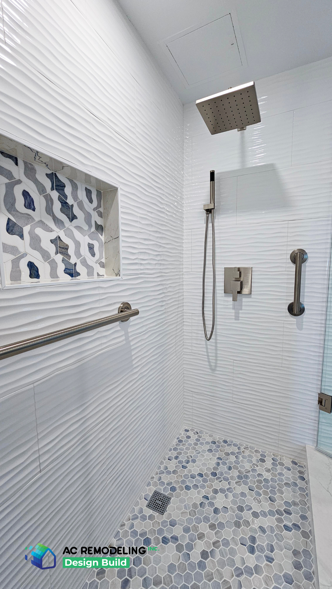 Shower with square rain head, handheld sprayer and blue picket mosaic niche