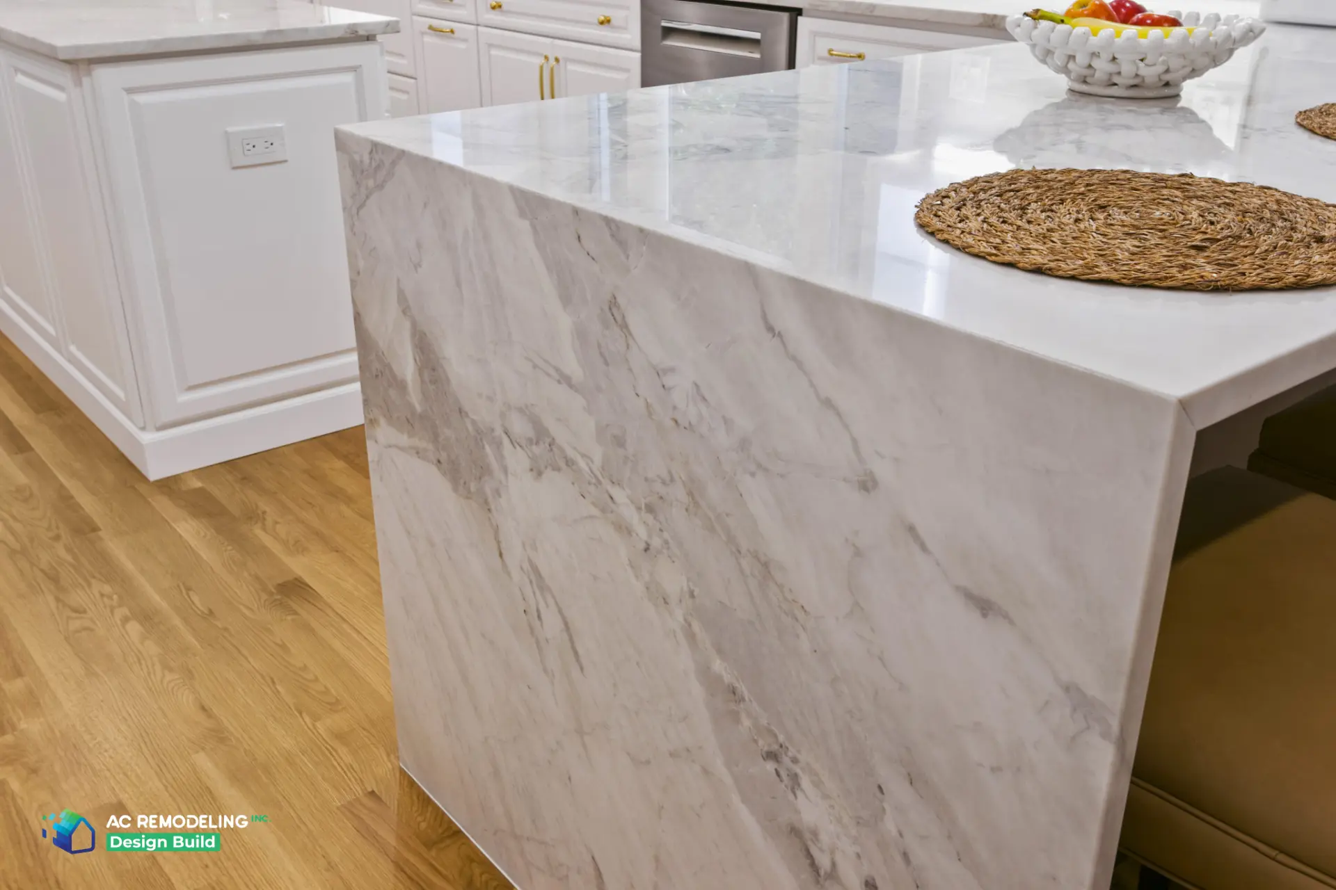 Detail of mitered marble waterfall edge on kitchen peninsula